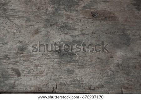 Texture of the wood on the table.