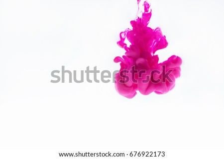 Pink ink in water