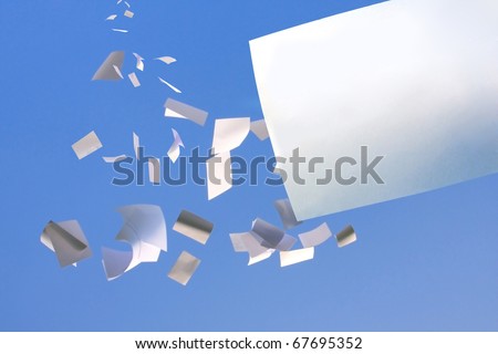 white paper falling from clear blue sky. Royalty-Free Stock Photo #67695352