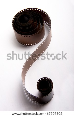 35mm film rolls on white background