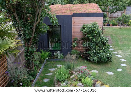 Garden room with living sedum roof Royalty-Free Stock Photo #677166016