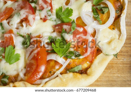 A photo of part of pizza on plate