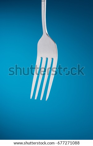 Fork in blue Background