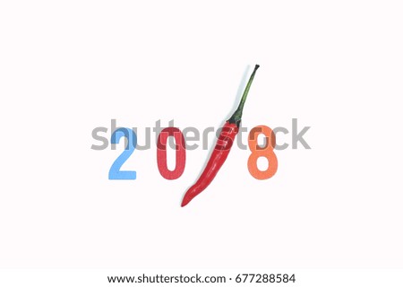 2018 New year concept : Chili with 2018 number with white background.