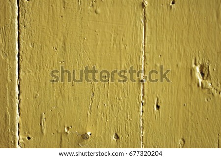 Grunge wood texture background. Texture of the painted surface. Yellow color
