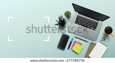 Office workplace with laptop, notebook, office supplies and stationery on turquoise background. Solution, business planning, creative, design, learning, start up or working flat lay top view concept.