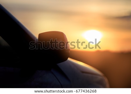 the silhouette of the car at sunset.