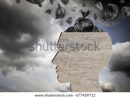 Head as wooden dustbin and falling garbage bags. Garbage and pollution concept. Dramatic sky. 