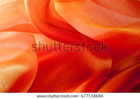 Texture, background, pattern. Orange Silk Fabric for Drapery Abstract Background. Abstract Fabric Flame Background, Artistic Waving Cloth Fractal Pattern