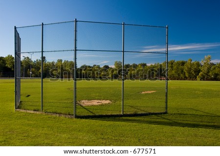 A batting cage at a small park Royalty-Free Stock Photo #677571