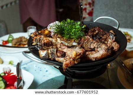 
A large meat dish on the festive table