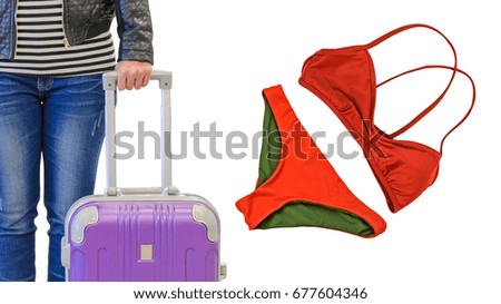 Summer vacation background, female passenger  wearing jeans and a black leather jacket standing and holding purple suitcase with red bikini, woman clothes isolated on white background.