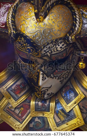 designed venetian mask close up - on the historical streets of Venice  