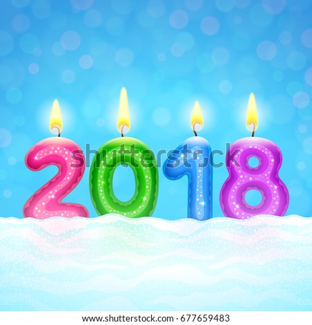 Colored lighting candles in shape of digits are forming together a number 2018, on abstract bokeh background