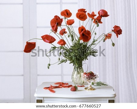 Still life with  bouquet red poppies