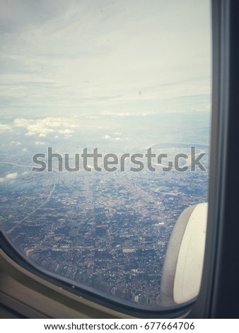 The picture from the plane from the window to see the sky.