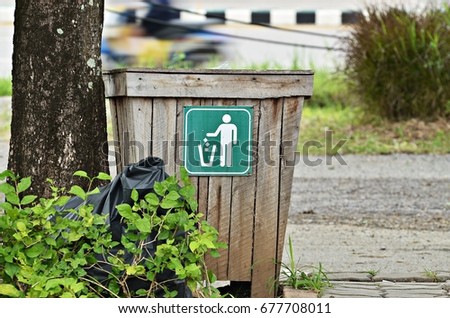 graphic sign show the picture a man leave a waste in waste bin
