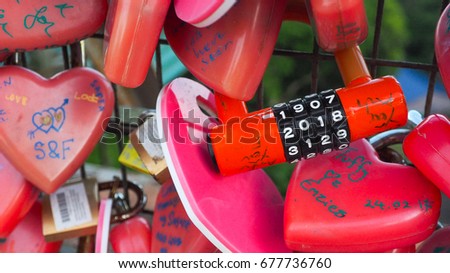 Key locked with password "2018" with background love padlocks at the open air observation deck of the Penang Hill, Malaysia Royalty-Free Stock Photo #677736760