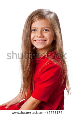 Little blond girl smiling. Isolated on white background