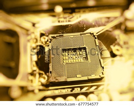Socket computer processor close-up of motherboard background. The picture was blurred or selective focus.