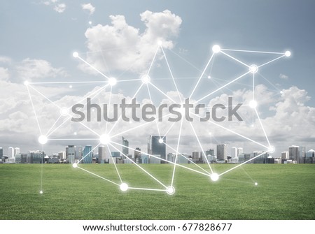 Modern cityscape green grass and social connection concept on screen