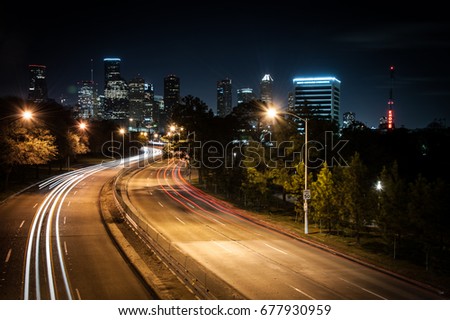 Light trails toward downtown Houston, Texas