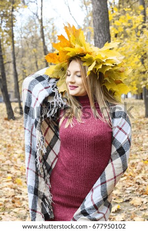 Girl in the autumn park