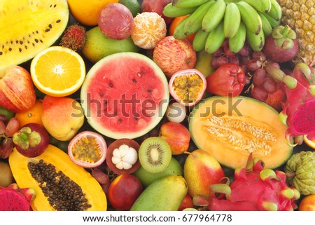Tropical fruits mixed together, fresh fruits background