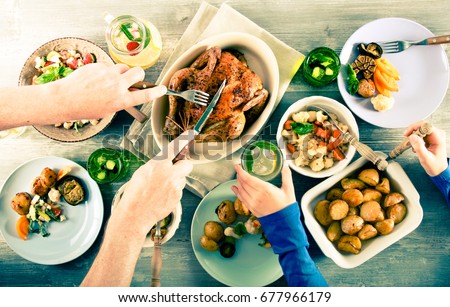 Family dinner. Top view people having dinner together at the rustic wooden table Royalty-Free Stock Photo #677966179