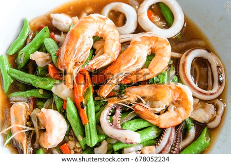 stir fried shrimp with bean on white plate