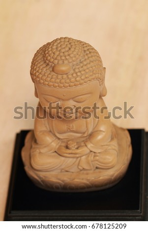 Buddha sculpture front far view (portrait layout)