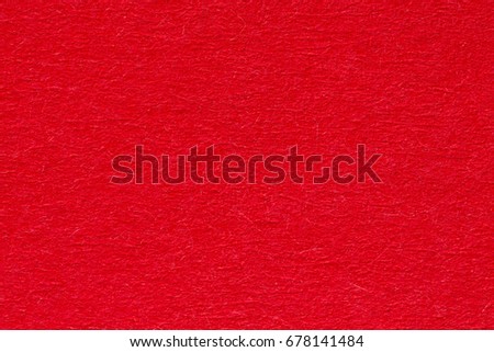 Red paper texture or background. High resolution photo.