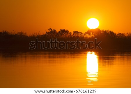 Sunset over Okavango River