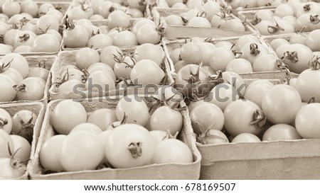 Sepia toned vegetables at a local farmer's market in the summer