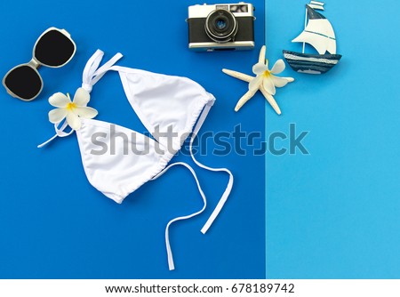 Summer Fashion woman swimsuit Bikini. Tropical sea.Unusual top view, colorful background.  Summer Concept.
