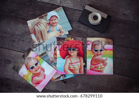 Photo album remembrance and nostalgia in summer journey trip on wood table. instant photo of vintage camera - vintage and retro style
