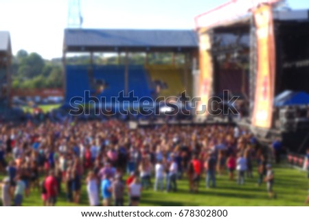 blur background of crowd at outdoor music concert                               