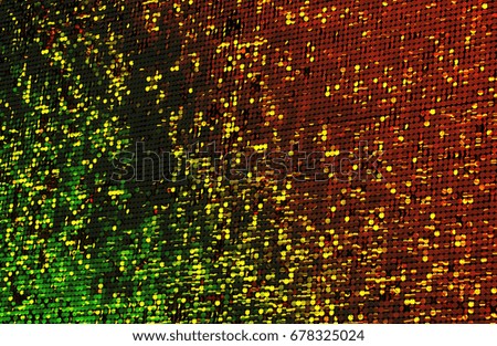 Abstract pixel background for creative design. Golden background of round gold discs chaotically rotating in wind. An unusual original chaotically changing background for design. Soft selective focus