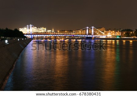 Crimean bridge with night illumination. Moscow river with night illumination. Crimean embankment, Moscow, Russia.