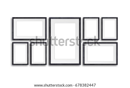 Collage of seven black wooden photo frames, interior decoration mock up