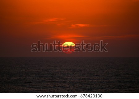 Red sunset over the ocean in Morocco