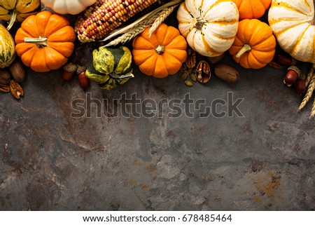 Fall copy space with pumpkins, nuts, wheat and corn