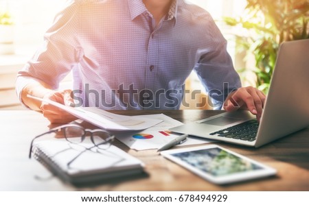 man working in the office.  Royalty-Free Stock Photo #678494929