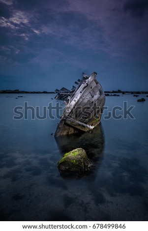 blue waters and shipwreck