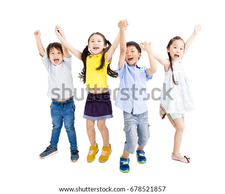 Group of happy  kids jumping and dancing Royalty-Free Stock Photo #678521857
