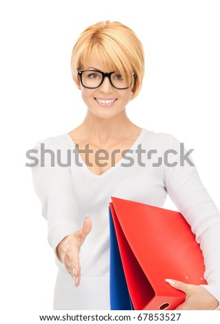 picture of  businesswoman with folders ready for handshake