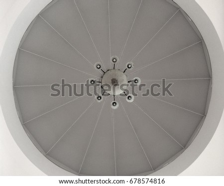 pattern background : inner view of a mosque dome with chandelier. picture taken from the bottom of chandelier