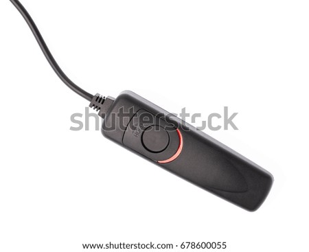 Remote control shutter switch of DSLR camera isolated on white background.
