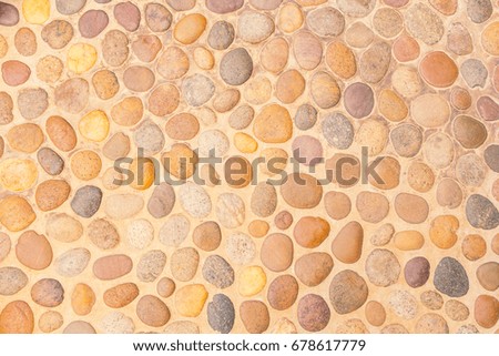 Pebble stone rock texture and background.