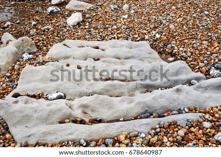 stone steps on a pebble beach